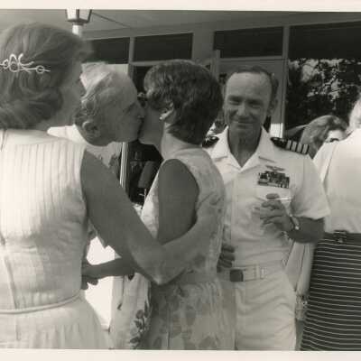 Unknown People at a ceremony greeting each other
