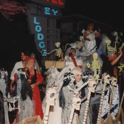 Unknown people on a float in the parade.