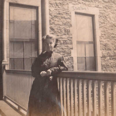 Isabel on a balcony