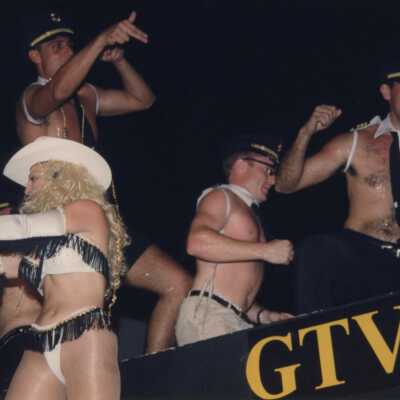 Unknown people dressed up on a float.