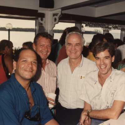 Unknown men at a get together/party.