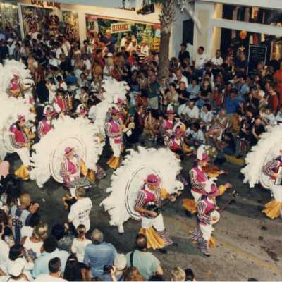 Unknown people walking in the parade.
