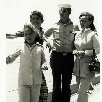 Unknown Sailor with Visitors Onboard a Ship