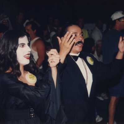 Unknown people dressed up.