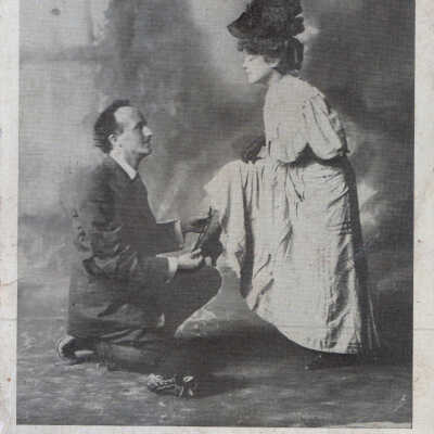 Man kneeling with a shoe