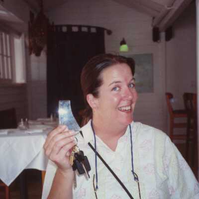 Unknown woman at an award ceremony.