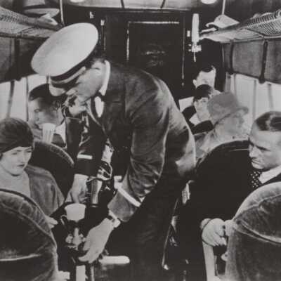 Passengers and steward on airplane: Copyright: © Key West Art & Historical Society; Origformat: Print-Photographic