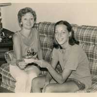 2 Unknown woman on a couch