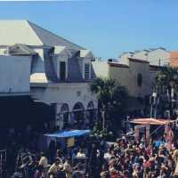 Page 60 and 61 of a magazine blown up and put on glossy paper.