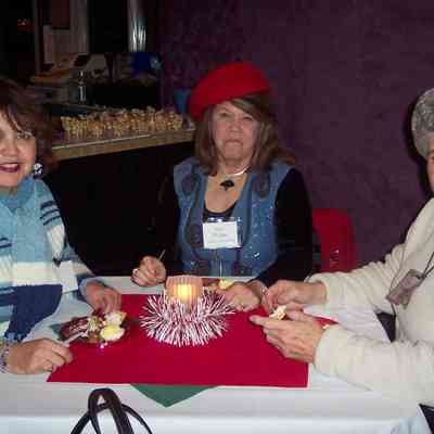 100_3867.JPG 512KB: Karen Babbs, Jerry Elsinga, Joy Muehlenbeck at 2004 holiday party