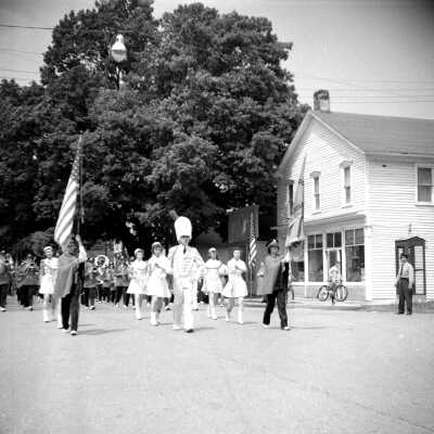 678 0/16	Saugatuck - Parade	1954	Memorial Day parade: Intersection of Center and Main in Douglas