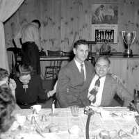          Jack Janis on the lap of Ev Thomas; From 