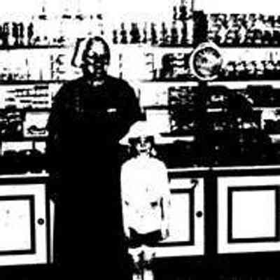 12KB: Goldie in full Dutch regalia when she worked at Dutch Village with a young friend..