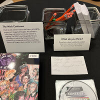          guest feedback table; cards posted on cork strip along timeline
   