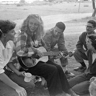 from Miss Moss web site: playing guitar