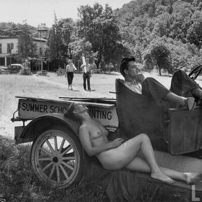 Photo and text from Miss Moss web site: This last photo was taken by Loomis Dean in 1949. “Nude Model Doris Fischer smoking cigarette as she takes a 5 minute break fr. posing for a half hour for students at Oxbow, The Art Institute of Chicago’s summer school.”

edit: i received an email from Professor Tony Jones, who is the Chancellor & President-emeritus of the School of the Art Institute of Chicago telling me a bit more about the school…

    Hello Diana in Capetown, South Africa, this is Tony Jones in Chicago, USA, sending to say a big Thank You for the story you posted about the Oxbow Summer School of Painting in Saugatuck, Michigan, USA.

    You are most perceptive (as are those who left comments) – Oxbow is indeed an idyllic place, almost a dream-definition of what a summer art camp of the beach would look like in a fantasy. But fantasy not – it’s real, and if you saw it today, the years between 2013 and year when these photographs were taken, 1948, would melt away. Oxbow is a flourishing haven for artists, and is run by the School of the Art Institute of Chicago (which is 150 miles away on the other side of Lake Michigan – Oxbow is on the west coast of Michigan – what is called “The Sunset Coast”). In the photograph showing the model atop a dune, being painted by a group of students, it shows the big lake in the background – but the pictures of students in canoes is the Oxbow Lagoon (now, how romantic is that ? – a private freshwater lagoon, with no powerboats, no jet-skis, and partly covered with flowering water-lilies, just like Monet’s gardens at Giverny. Artists mount easels on the canoes and paddle out into the lily-fields to paint directly from nature).

    And speaking of models – yes, we still teach a class called The Figure in the Landscape, and you’d find a model posing (wearing only bug-spray) and students painting her … along with classes in sculpture, printmaking, bronze-casting, wrought-iron, ceramics, textiles, papermaking, and glassblowing … in a wonderful open-air hot-glass studio right on the edge of the lagoon.

    Oxbow is now over 100 years old and we still run it as it always was – an escape from busy downtown Chicago to a silent, calm, rustic retreat of about 150 acres, set on the lagoon, surrounded by thick woodlands, several herds of deer, with no cars, no streetlights, just studio and very basic cabins for sleeping, beautiful workshops and The Inn, the gathering place where we provide all meals (the belltower chimes and you come back from wherever you are and eat en famille – then go back to your work. At Oxbow you come just to work, there are no distractions, you are there at your own speed to draw or dream). Oxbow is a very special place, deeply loved by all who attended or taught there, and we keep it that way – and the list of alumni is quite extraordinary : imagine the summer when one of the students, short of cash, but with a culinary talent that matched his art ability, agreed to be the paid cook … and returned the following summer from his Art Institute studies in sculpture to work in the Oxbow studios – he is Claes Oldenburg, founder of the Pop Art movement in New York, and one of America’s leading and most influential artists (and Oxbow alumni !).

    This article from LIFE is really a joy – and quite a number of the people in the photographs have been identified, some still alive and recalling the period well. I’m contacting LIFE to see of they still have the originals and the out-takes that never made it to the magazine – I am currently writing about the School of the Art Institute and it’s various off-site art-camps (in Colorado, Wisconsin, Michigan and even Mexico), so your link came to me with great delight – thanks thanks and thanks again.