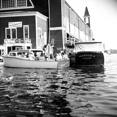732 0/5	Saugatuck - boats	8/1953	Sportsman docked at Pavilion: Mardor - Sportsman was a charter boat likely owned by Mike DeGaetano and skippered by Jack Baker