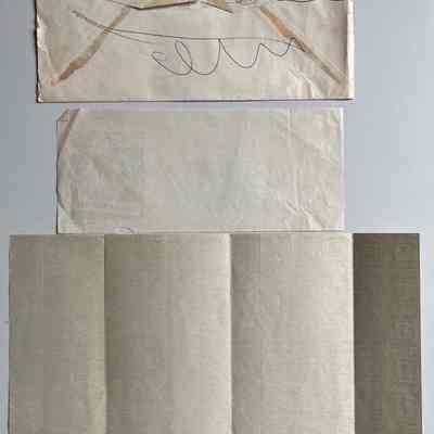 1. Envelope, insert and World War II fuel oil ration stamps backs