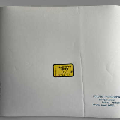 All photos have yellow Plantiff's exhibit stickers on the back.: Photos taken in 1967 have a stamp from Holland Photography