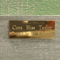          brass plate on frame, bottom center; Cora Bliss Taylor Donated by B.J. Siverstone (to Saugatuck-Douglas District Library)
   