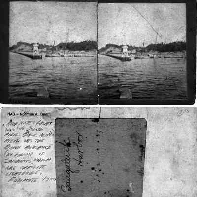 Harbor_mouth_ca_1895.jpg 1.5MB: Norman A. Deam note: Light was on south pier. Back along pier was the Bird Beach House [Bath house] in front of the sand dunes, which are opposite lighthouse. Estimate 1900. Saugatuck Harbor.