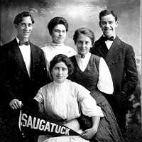          Family group in studio postcard; FamilyPostcard
   