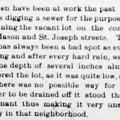 cr1906112302VacantLotMasonandStJoseph.jpg: Sewer for vacant lot at corner of Mason and St. Joseph streets