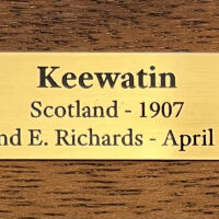          plaque located on center front of model
   