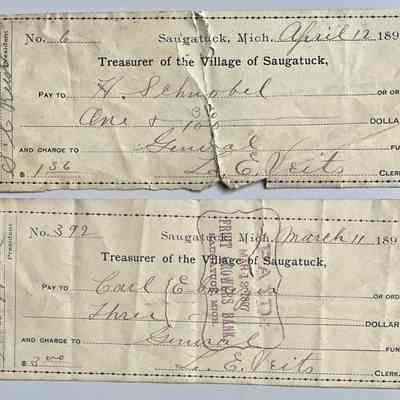 C. Two loose checks from 1897 and signed by  clerk L.E. Veits.