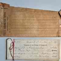          A. Fruit Growers Bank envelope
B. Sixteen checks bundled in pink twine, signed by the Saugatuck Village Treasurer R.B. Newnham in 1891.
   