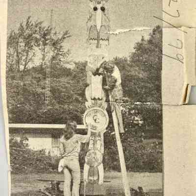 Commercial Record 27 Sep 1979: Saugatuck's historic (as opposed to prehistoric) totem pole (a development usually associated with tribes of the Pacific Northwest) gets a coat of paint for the first time in many years in preparation for the Indian Summer Festival being put on this Saturday and Sunday by the Saugatuck-Douglas Chamber of Commerce. Doing the painting are chamber secretary Debbie Potts, on the ladder, and Jody Kievette. Jim Potts cleared the spot of vines. The totem pole was created and put up originally by the Hoffman tribe.
Clipping is located in Chamber of Commerce, general box