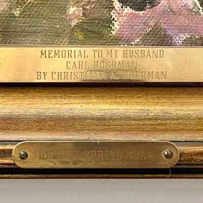 Two plaques on center front of frame: Memorial to my husband Carl Hoerman by Christiana A. Hoerman, Desert Spring Song.