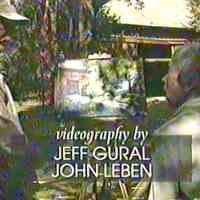 Artist Bob Fagan and homeowner Mary McKamy discuss the finished watercolor painting.