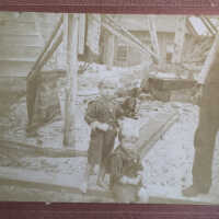          Father Reuben Sewers (Sr.) with twins Rube and Frank
   