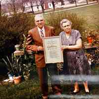          William and Lilly Scott of Douglas with their golden (50th) wedding anniversary artwork
   