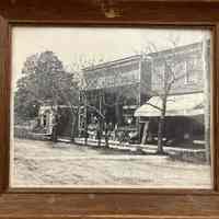          Photo as it arrived in a frame.; Photo has been removed from frame in July 2024 as per conservation best practice.
   