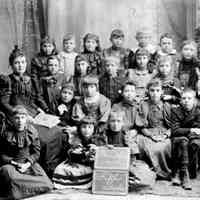          0022 May the Teacher.jpg 1.1MB; MAY AND HER SCHOLARS, c1893-5

May Francis Heath was a school teacher in her youth, first teaching in rural schools, and then the Saugatuck Union School. From the Lakeshore Commercial (Commercial Record) of the times we see that May was hired to teach the primary department of the Ganges School in March 1892, before she had herself received a High School Diploma. In later years she spoke of the poverty of her family as a child and perhaps that is why she went to work so early.

She did get her degree as a member of the Saugatuck High School Class of 1893, giving the Valedictory address, an essay entitled 