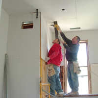          hanging drywall
   