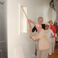          Nancy Budd and Dottie Lyon ringing the bell; Lady in white hat unknown, Cynthia Sorensen (in red) and Maryrita Peters (in yellow)
   