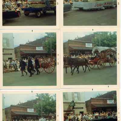 94-1-13A_Saug._Centennial_parade.jpg 1.4MB: Johnny Appleseed, Fire Department Hose Reel, covered wagon, crowds outside the Embassy