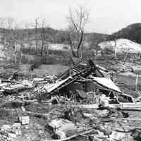          Mod3 Likely to Use - 49.jpg 1.7MB; This image was featured for History Mystery#2 with the solution: Wreckage of the 1859 lighthouse after being struck by a tornado in April 1956. The owner, Arthur Deam, can be seen picking through the debris. About five years later, the present cottage was built on the old lighthouse site (just north of Oval Beach).
   