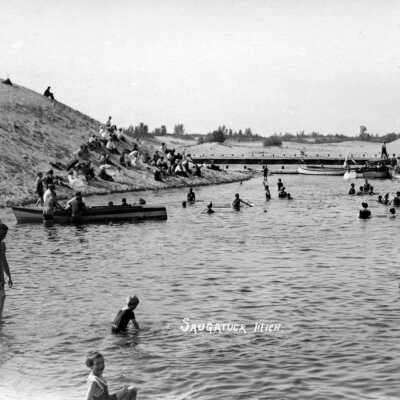 Swimming beach just inside the new piers ca 1910.: Basin beach postcard