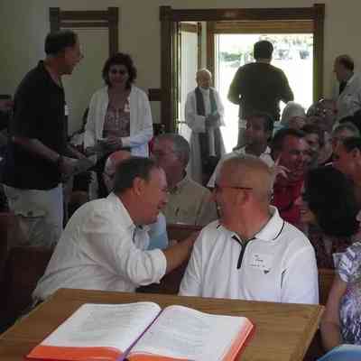 © The Holland Sentinel June 26, 2013: Graduates of St. Augustine Seminary High School and their families file into the Chapel at Shore Acres for a reunion Mass on Saturday, Aug. 11. Jim Hayden/Sentinel staff