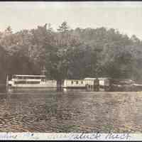          Eraline 1926 Saugatuck Mich - two level yacht moored by three river bank buildings
Jane Ann Hungerford 