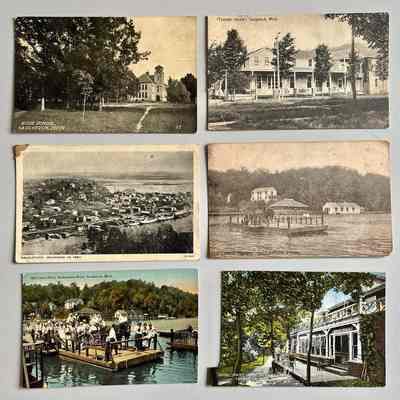 early b/w or colorized postcards front: High School, Tourists Home (mailed with text on reverse), View from Mt. Baldhead 1881, Old Chain Ferry scow, Old Chain Ferry scow colorized, Swift Villa colorized with long notch removed from left edge.