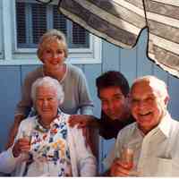          Mary (Johnson) Otto (standing) and maybe John Otto with unknown woman and man seated in foreground; Dorothy and Tom Otto had two children John Otto and Mary (Otto) Johnson.
   