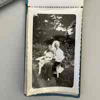          posed on chair in the garden
   