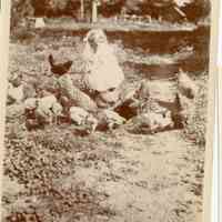          At Orchard cabin Douglas.jpg 1.5MB; Bucolic scene of child with chickens
   