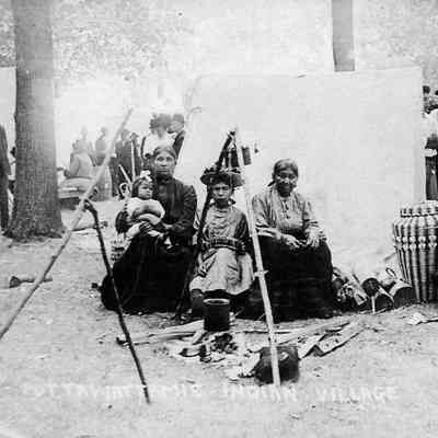 Pottawattomie_indians_posing.jpg 393KB Digital image transfered from photo blog, June 2023: This is another image of an "Indian Village" likely captured by J.A. Little from the Loren and Marsha Kontio collection.