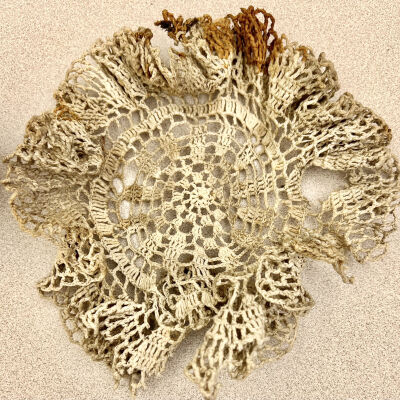 2. White, round lace doily